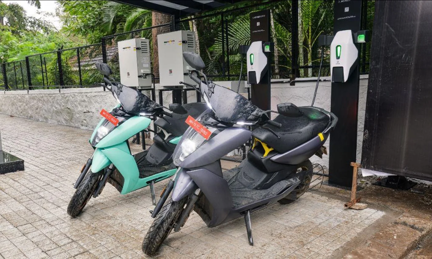 Electric scooters parked at Ather Grid DC charging stations